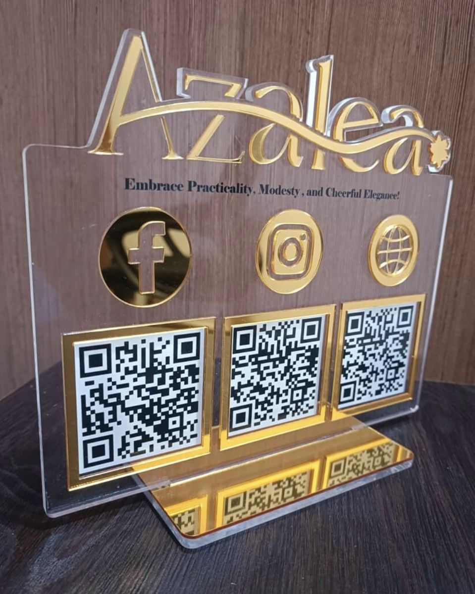 Clear acrylic sign with gold mirror lettering