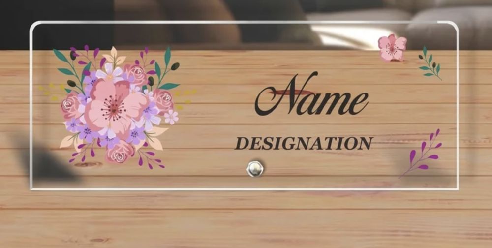 Clear acrylic name plate printed with flowers and a name